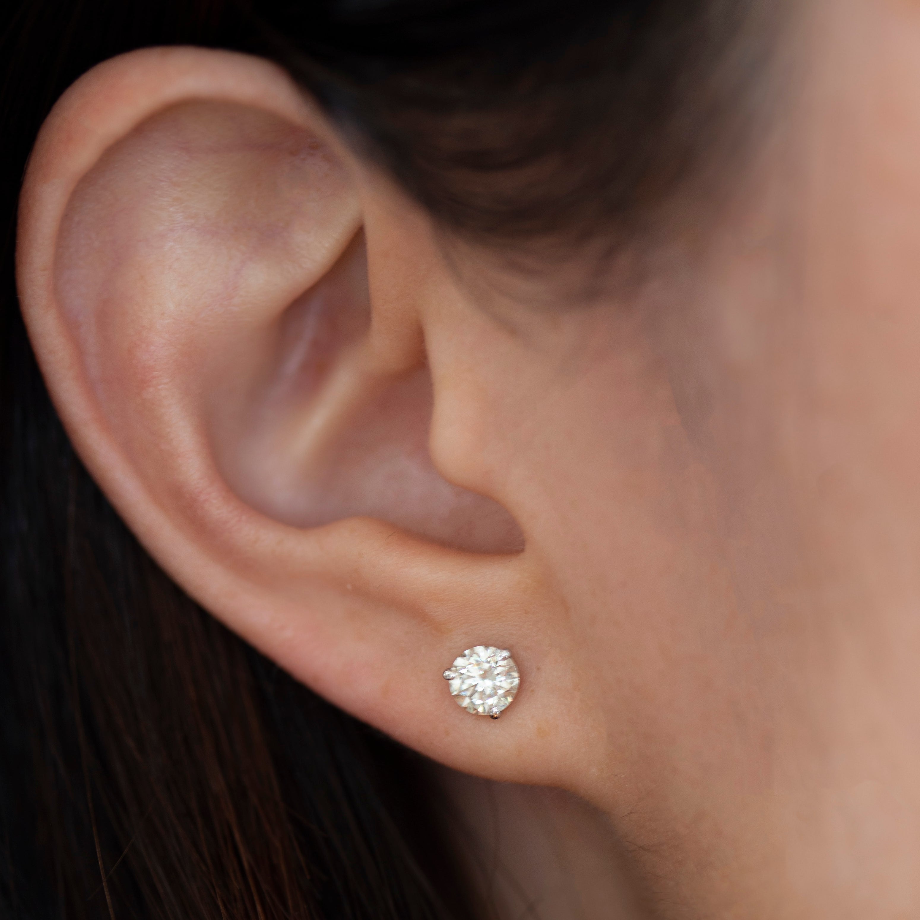 Enhance your elegance with these exquisite 14Kt gold lab diamond earrings, featuring a mesmerizing 1 Ct. TW. Martini set for a touch of sophistication. A must-have staple for every occasion.