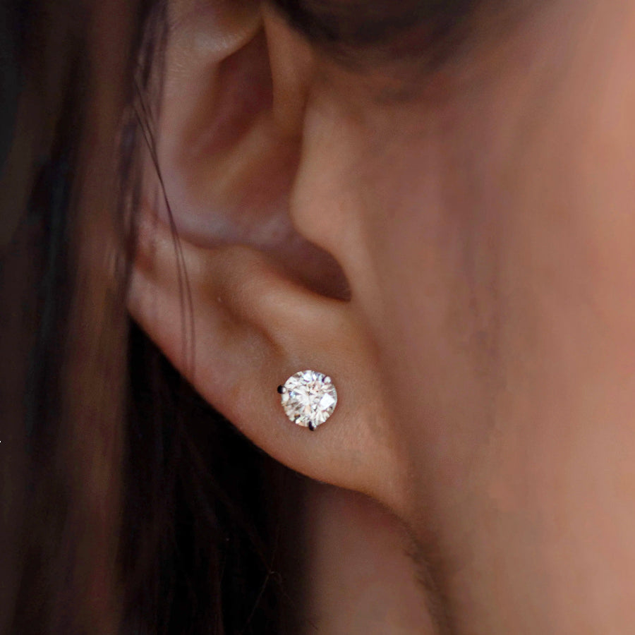 Enhance your elegance with these exquisite 14Kt gold lab diamond earrings, featuring a mesmerizing 1 Ct. TW. Martini set for a touch of sophistication. A must-have staple for every occasion.