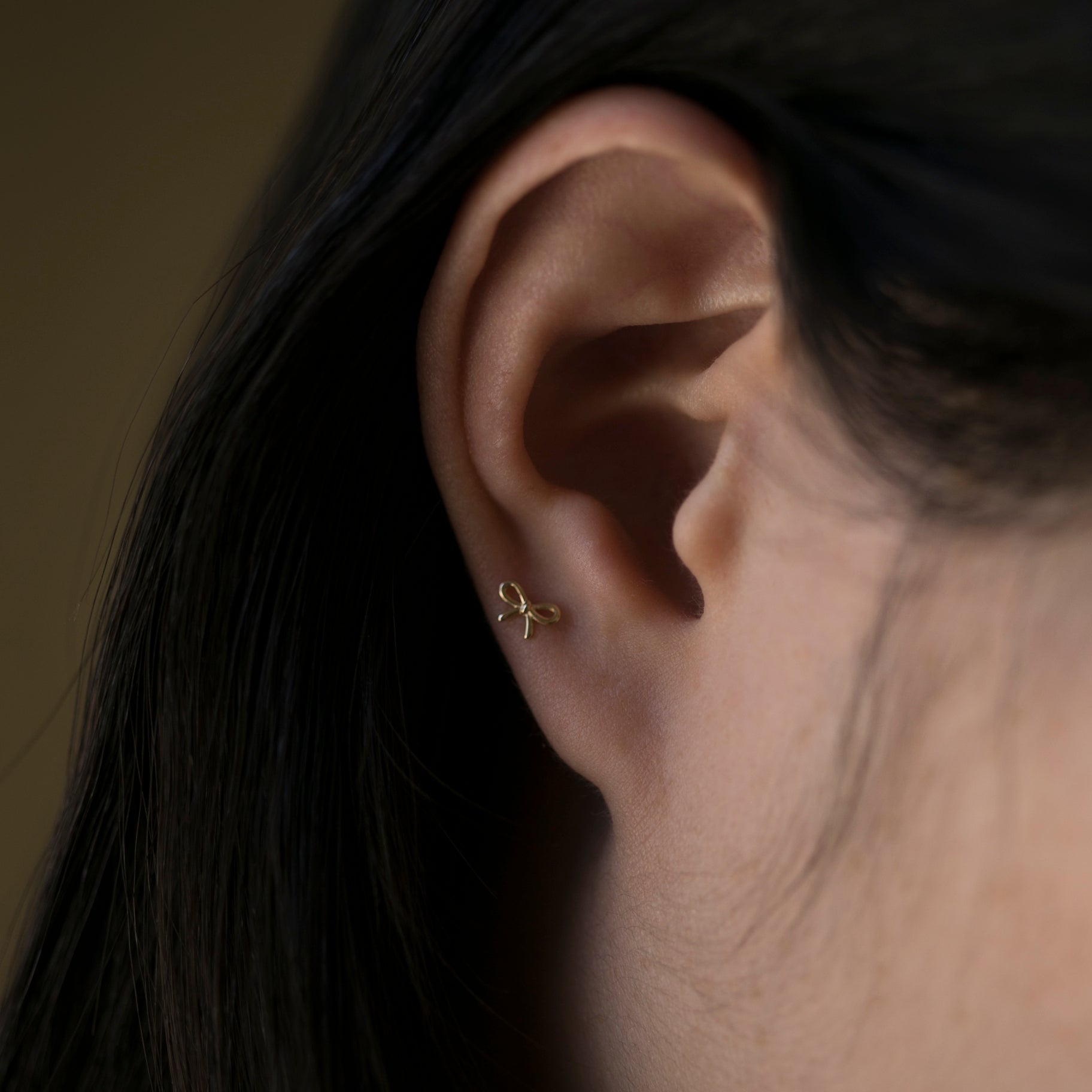 bow stud earrings
