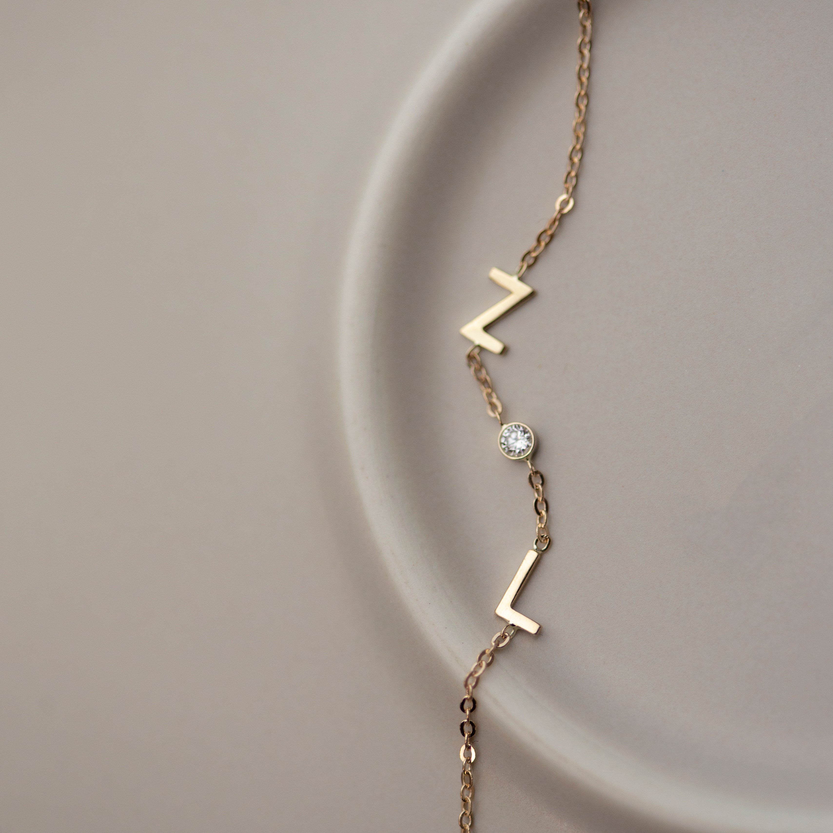 Personalized 14k solid gold initials bracelet with genuine diamond.