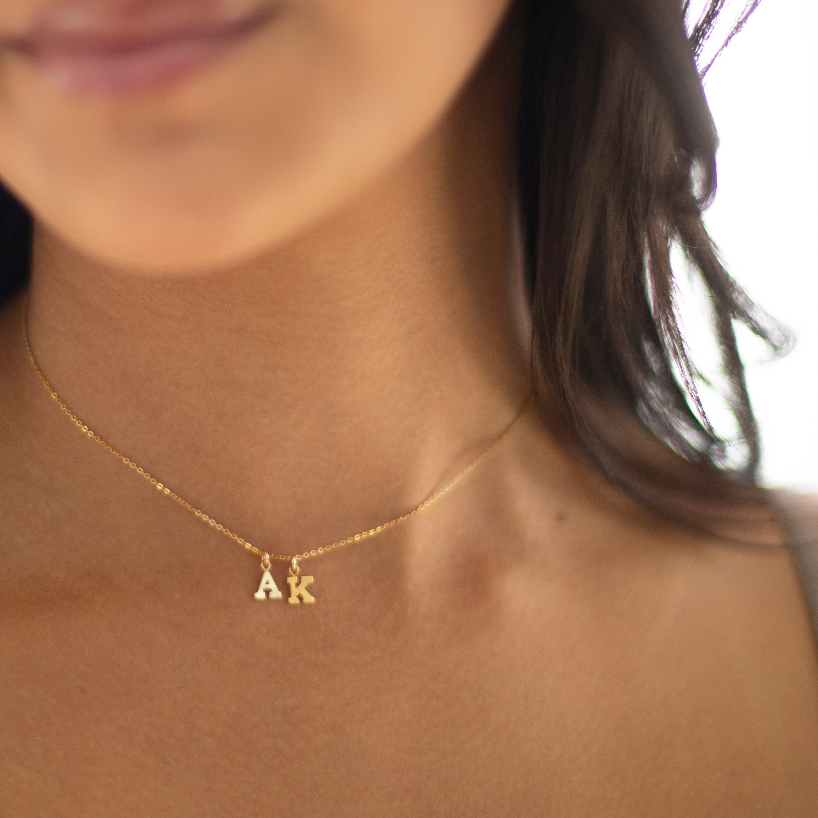 Mini initial necklace, perfect for adding a personal touch to any outfit.
Dainty Initial Necklace - Perfect wearing alone or layering with your favorite necklaces.
Super dainty & fun.