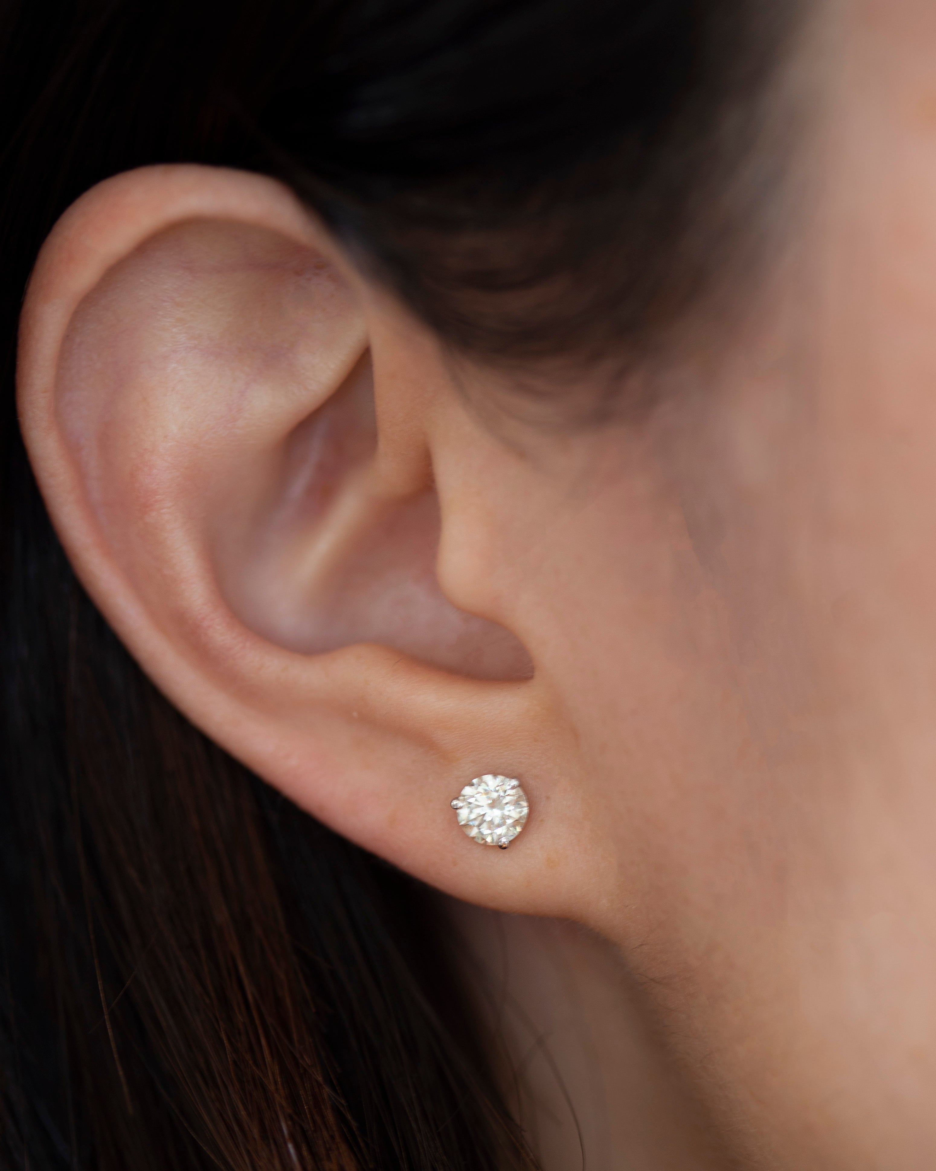 Enhance your elegance with these exquisite 14Kt gold lab diamond earrings, featuring a mesmerizing 1 Ct. TW. Martini set for a touch of sophistication. A must-have staple for every occasion.