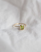 The octagon-shaped peridot on this ring is both eye-catching and elegantly simplistic. It is the perfect way to celebrate a special August birthday or simply adorn oneself with its stunning light green hue.