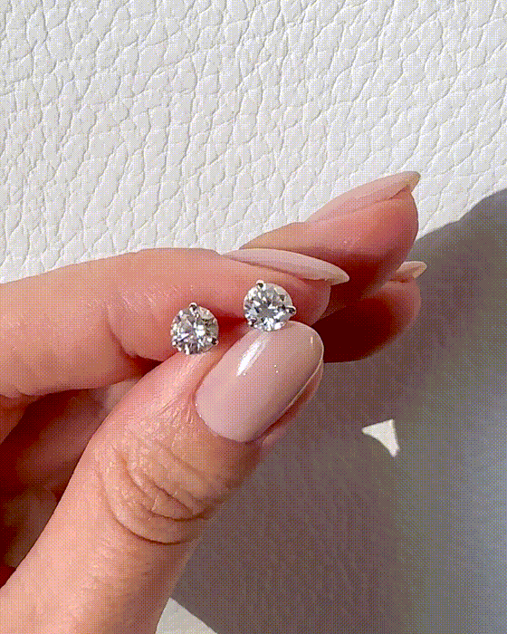Enhance your elegance with these exquisite 14Kt gold lab diamond earrings, featuring a mesmerizing 1 Ct. TW. Martini set for a touch of sophistication. A must-have staple for every occasion.