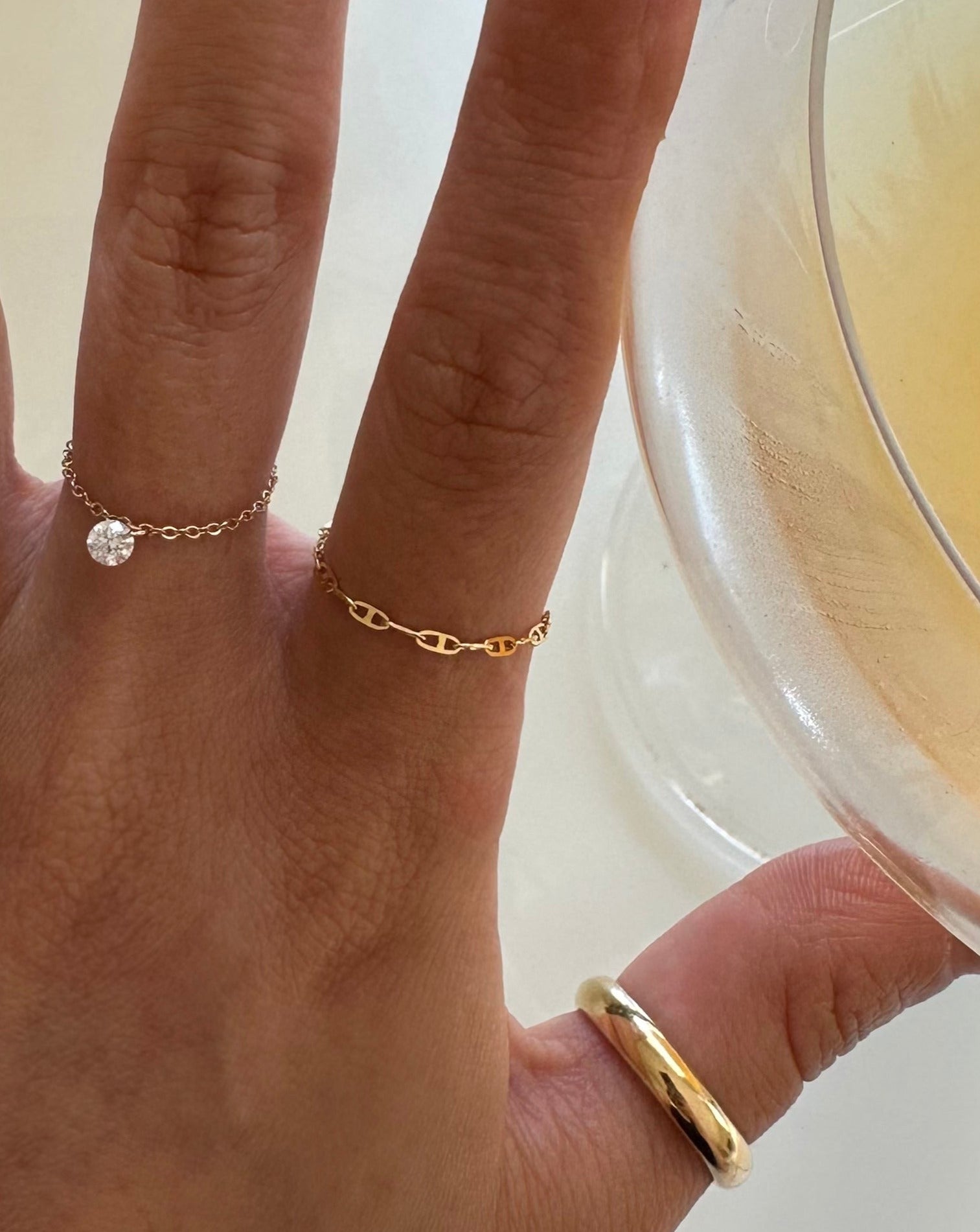 Bare diamond ring and anchor chain ring