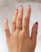 The octagon-shaped peridot on this ring is both eye-catching and elegantly simplistic. It is the perfect way to celebrate a special August birthday or simply adorn oneself with its stunning light green hue.