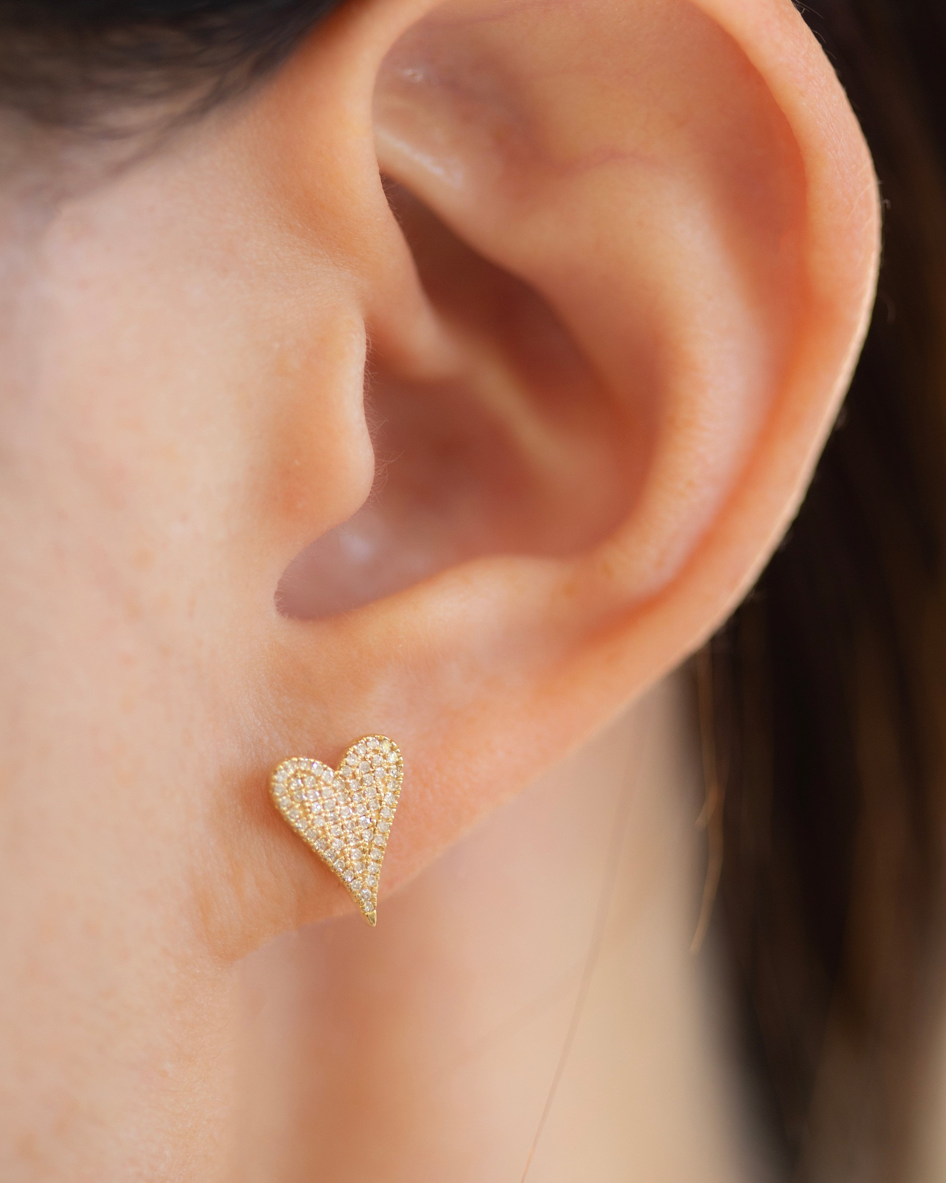 Small Pave Diamond Heart Earrings

Elevate your style with these elegant 14K Small Pave Diamond Heart Earrings. Exquisitely crafted with small pave diamonds for a subtle yet, luxurious look. These earrings make a perfect gift or an exquisite addition to your own collection. Be sure to sparkle and shine with these exquisite heart-shaped delights.