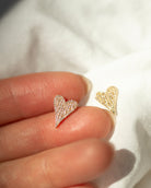 Small Pave Diamond Heart Earrings

Elevate your style with these elegant 14K Small Pave Diamond Heart Earrings. Exquisitely crafted with small pave diamonds for a subtle yet, luxurious look. These earrings make a perfect gift or an exquisite addition to your own collection. Be sure to sparkle and shine with these exquisite heart-shaped delights.