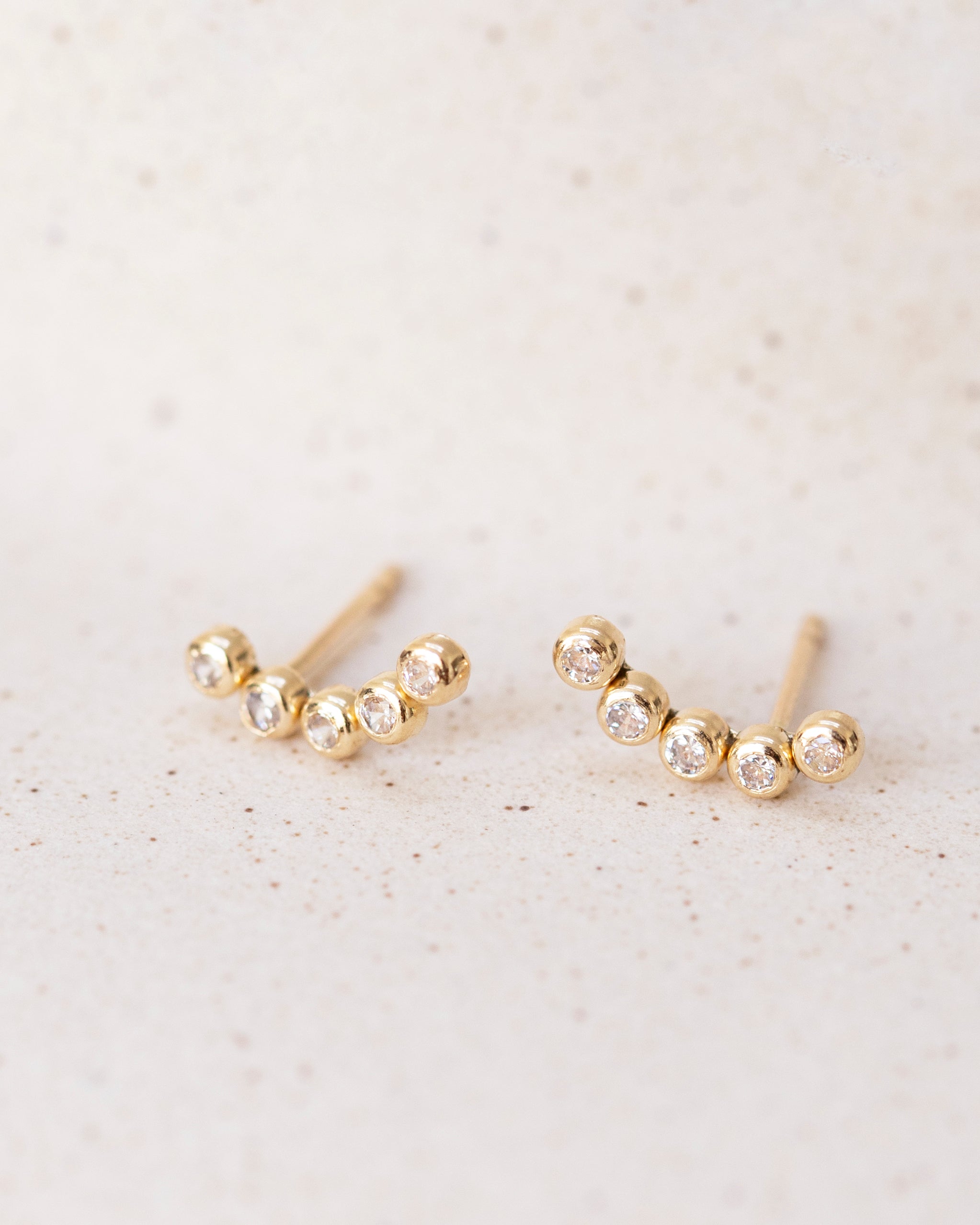 14K Yellow Gold CZ Crescent Moon Stud Earrings - Simple and elegant easy-wear for everyday stud earrings!
Minimal Swoop Climber Earrings in 14K Gold.
Little Crescent Moon studs are so simple, neat and stylish!
