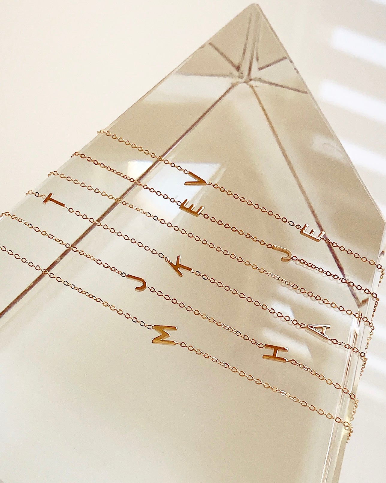 Customize your 14K solid gold initial bracelet. An understated, sleek everyday accessory. Ideal for gifting your loved one.