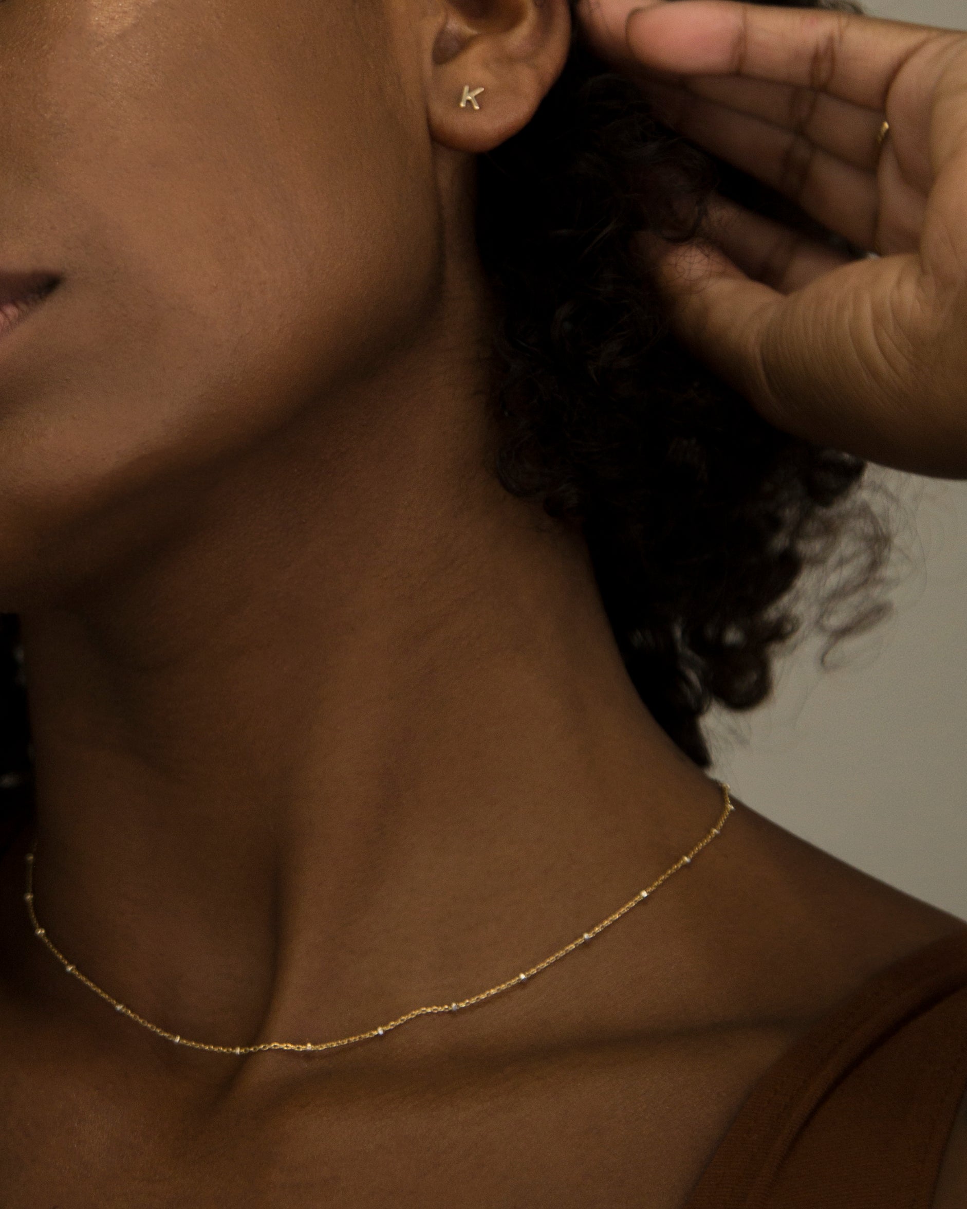 14K Initial stud Earrings - Enhance your style with a touch of sophistication and elegance using our 14K Solid Gold Initial Stud Earrings. Show off your initial and elevate your look with this exquisite accessory. Can be worn alone or paired with other earrings to create a stylish ear stack.