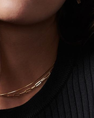 This Chunk paperclip Chain Necklace features oversized links encased in a box-shaped design, making it a versatile and trendy accessory for any outfit.