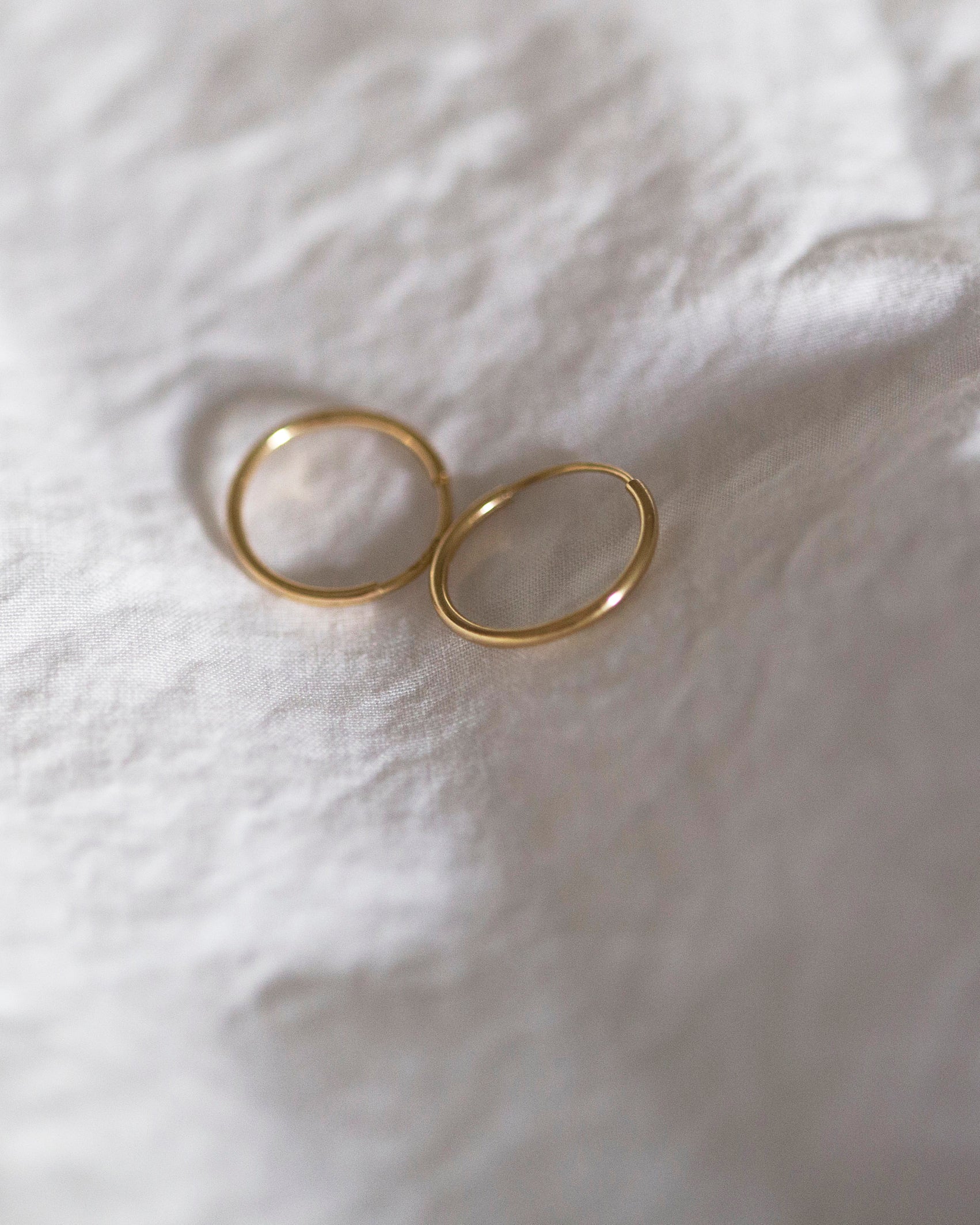 Gold Endless hoop earrings
Must have staple piece