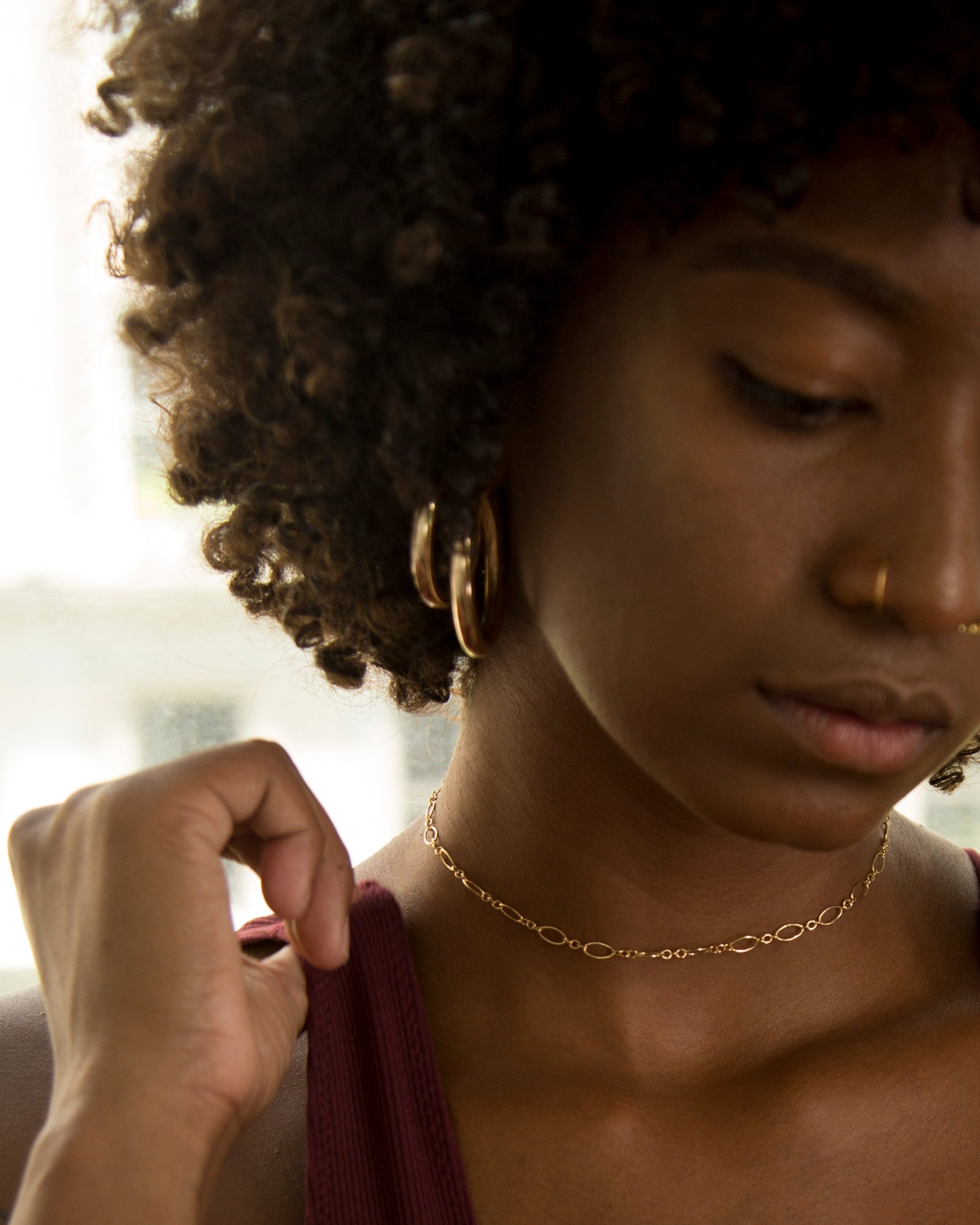 Expertly crafted from high-quality gold, these Chunky Hoop Earrings are a timeless addition to your jewelry collection. The classic design ensures versatility and elegance for any occasion, making them a must-have staple piece in your wardrobe.
