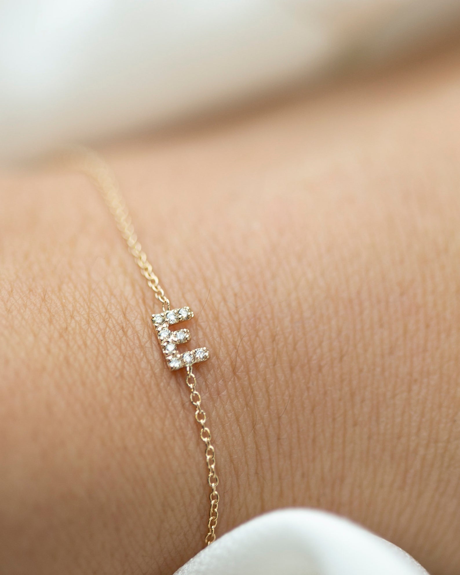 Personalized 14k solid gold mini diamond letter bracelet!

Indulge in understated luxury with our 14k Gold Mini Diamond Initial Bracelet, a delicate yet dazzling addition to your daily wardrobe. Adorned with a sparkling diamond and customizable with your choice of uppercase alphabet initial, this bracelet adds a touch of elegance and personalization to any outfit. The perfect choice for the woman who values simplicity and sophistication in her everyday style.

Great as a gift for special someone or for your