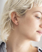 Swoop Climber Earrings

Minimal Swoop Climber Earrings in 14K Gold filled - Hammered or Shinny,
Little Crescent Moon studs are so simple, neat and stylish!