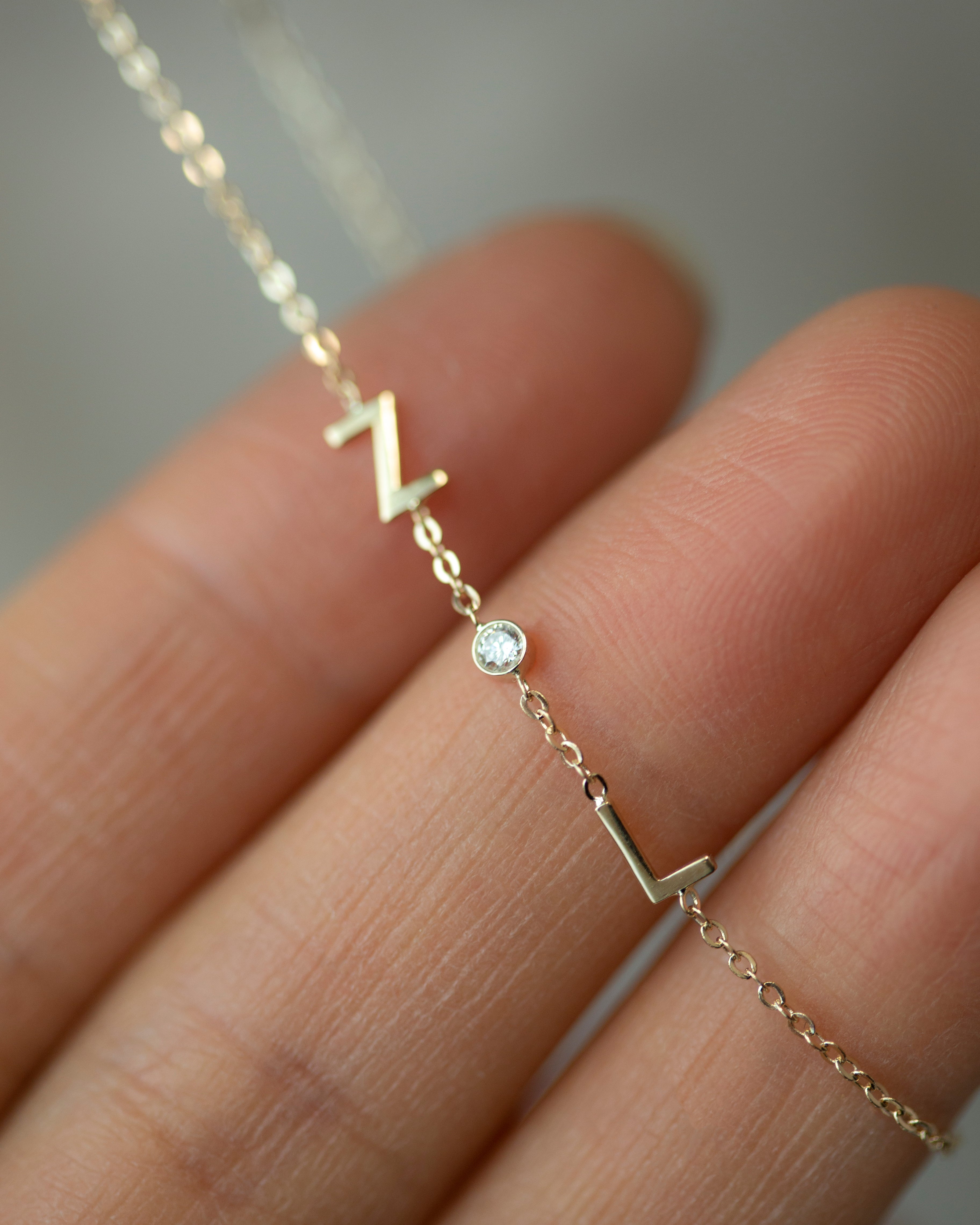 Personalized 14k solid gold initials bracelet with genuine diamond.

Simple, minimalist everyday bracelet with a little sparkle
Perfect wearing alone or layering with your favorite bracelets.