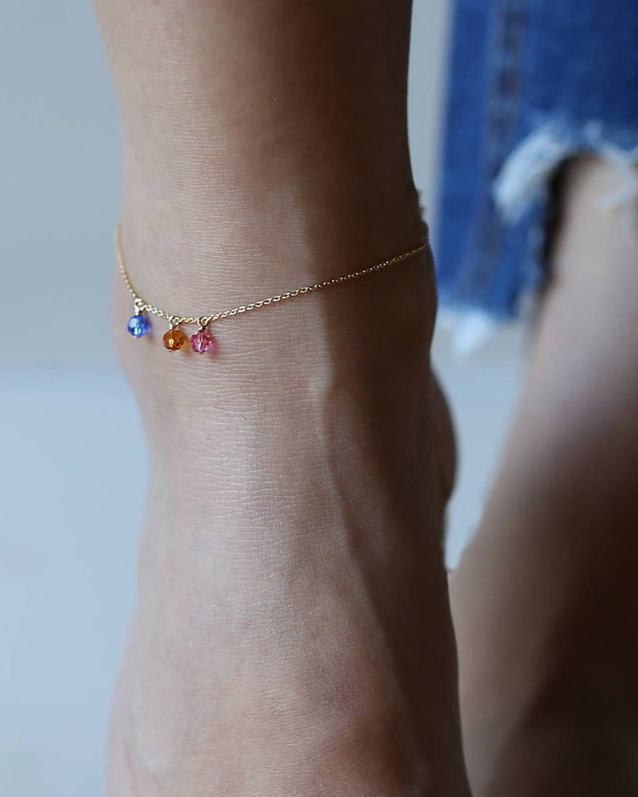 Simple 14k gold filled/Sterling silver thin anklet with Birthstone crystal.

Perfect Gifts for her - Birthstone crystal adds extra personal touch.

This special ankle bracelet is perfect personalized gift for anyone.
Small genuine Swarovski birthstone crystals dangle
from beautiful 14K gold filled or sterling silver shinny chain.