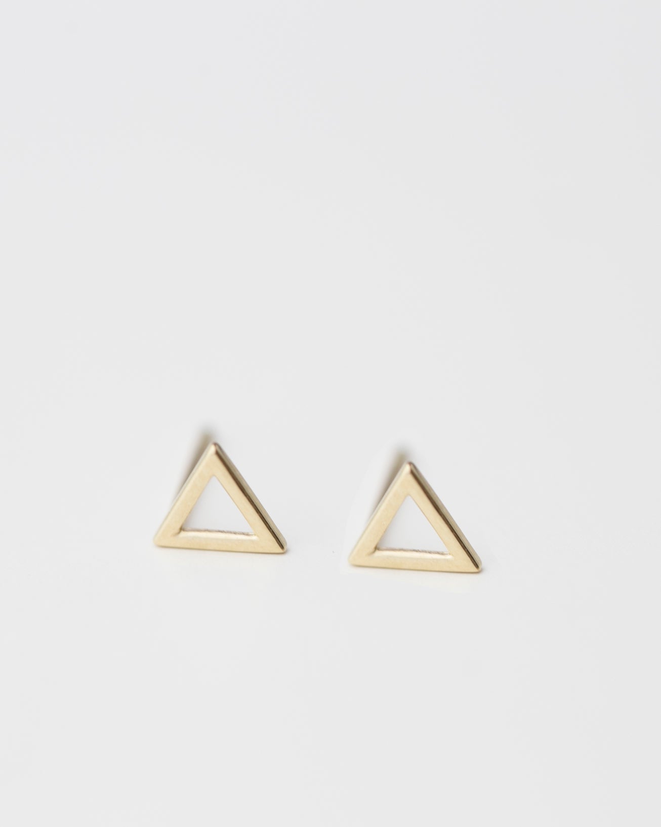 These small triangle stud earrings are one of our geometric shape series that will be perfect for everyday wear.
