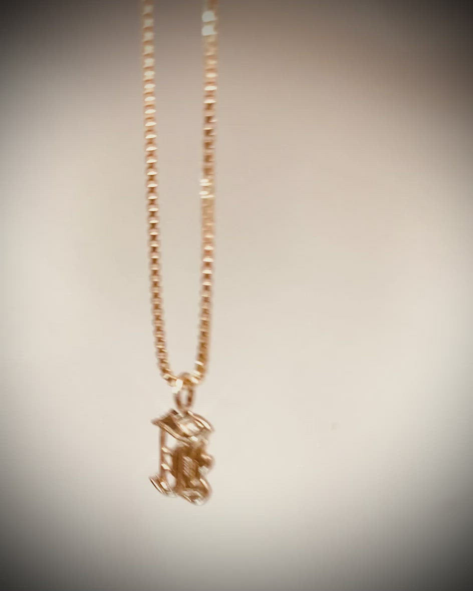 This Old english initial necklace is the perfect combination of edgy and elegant to make a unique statement.