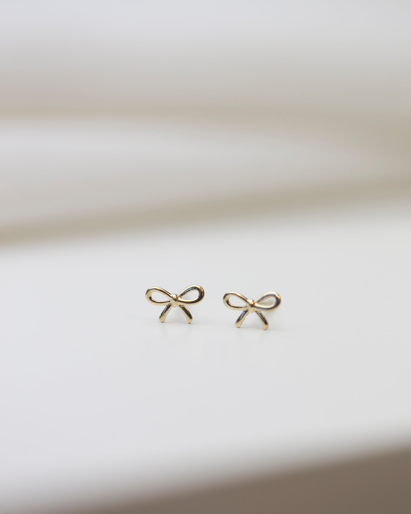 14k gold bow earrings