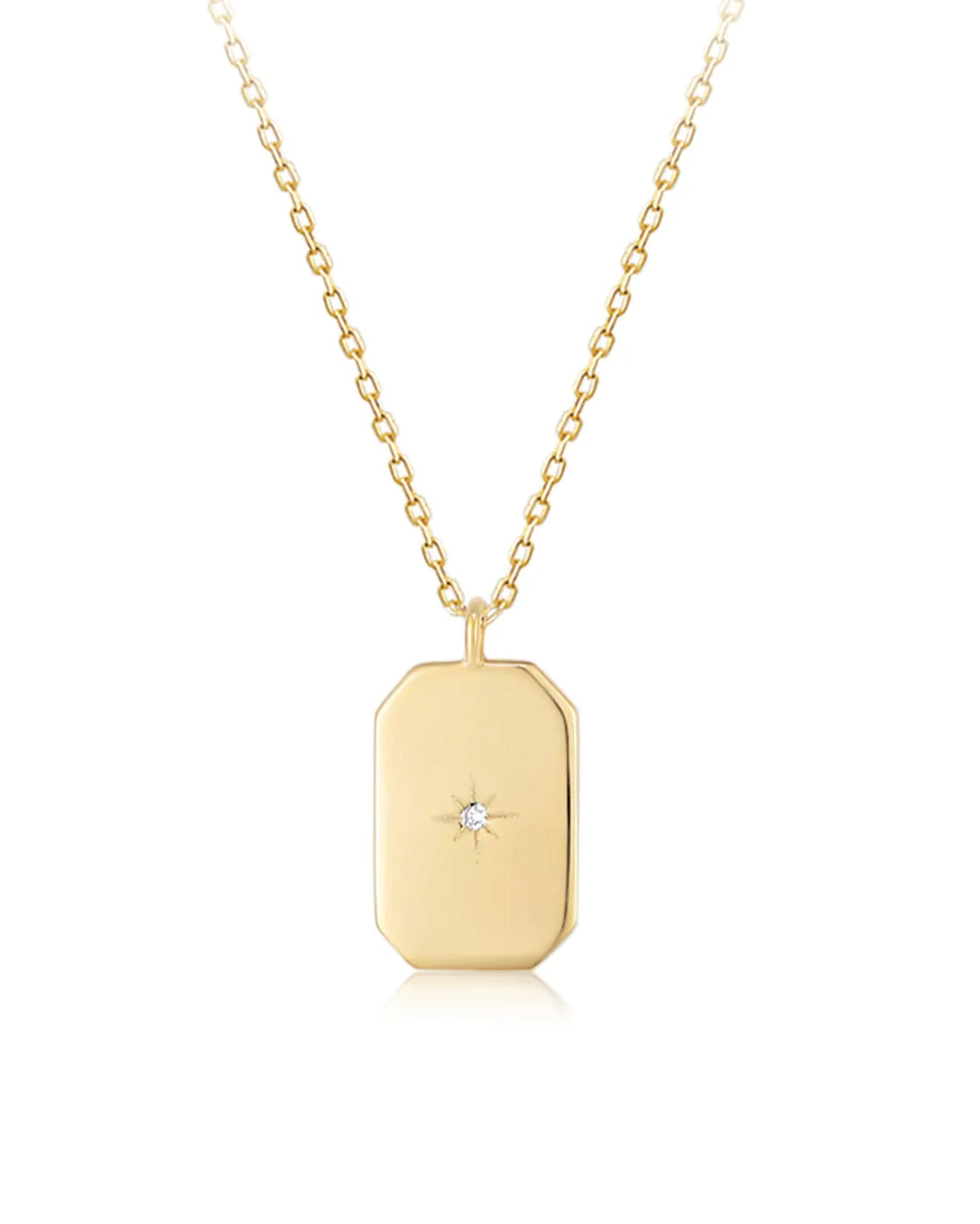 This 14k Gold Mini Diamond Tag Necklace is minimalistic and simple, yet adds a special touch with its small diamond star tag. It provides the perfect everyday accessory when worn alone or layered with other necklaces.