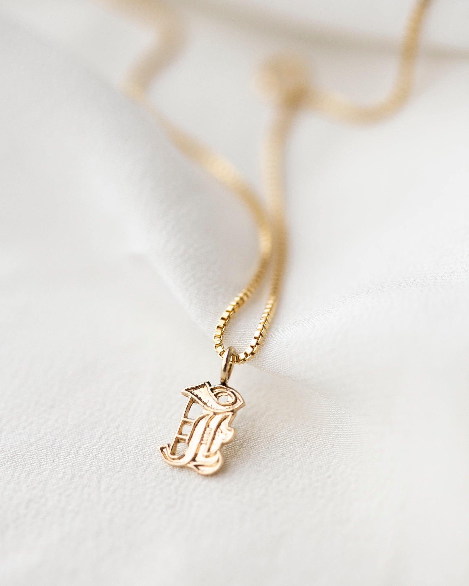 This Old english initial necklace is the perfect combination of edgy and elegant to make a unique statement.