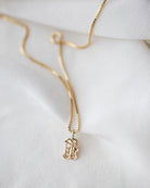 This Old english initial necklace is the perfect combination of edgy and elegant to make a unique statement.