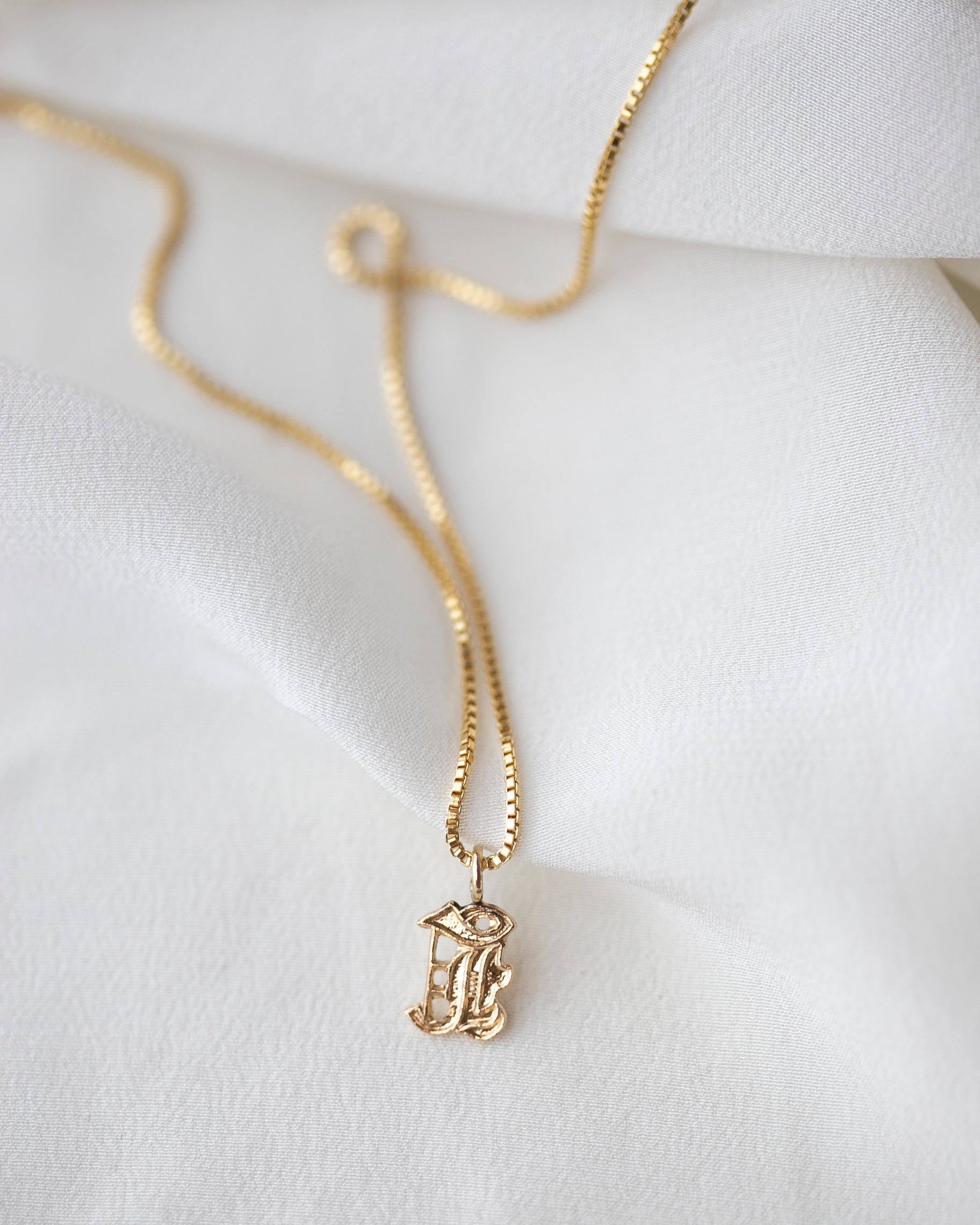 This Old english initial necklace is the perfect combination of edgy and elegant to make a unique statement.