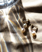 Gold Endless hoop earrings with pearl earrings
Must have staple piece