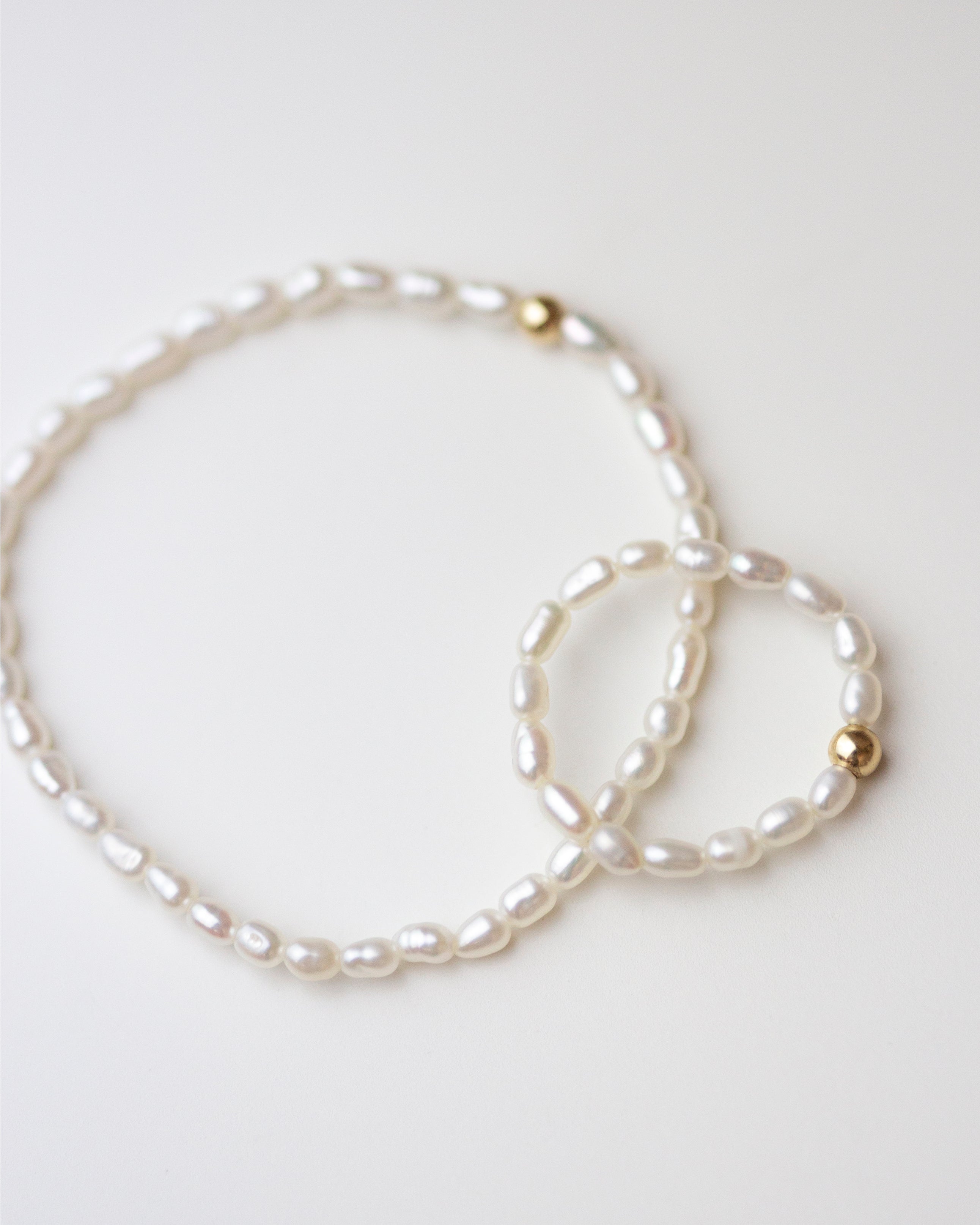 Baby Pearl Bracelet


Made with mini rice shape fresh water pearls and gold filled bead on comfy stretchy elastic band. Baby pearl bracelet will be the perfect addition to your arm stack!
