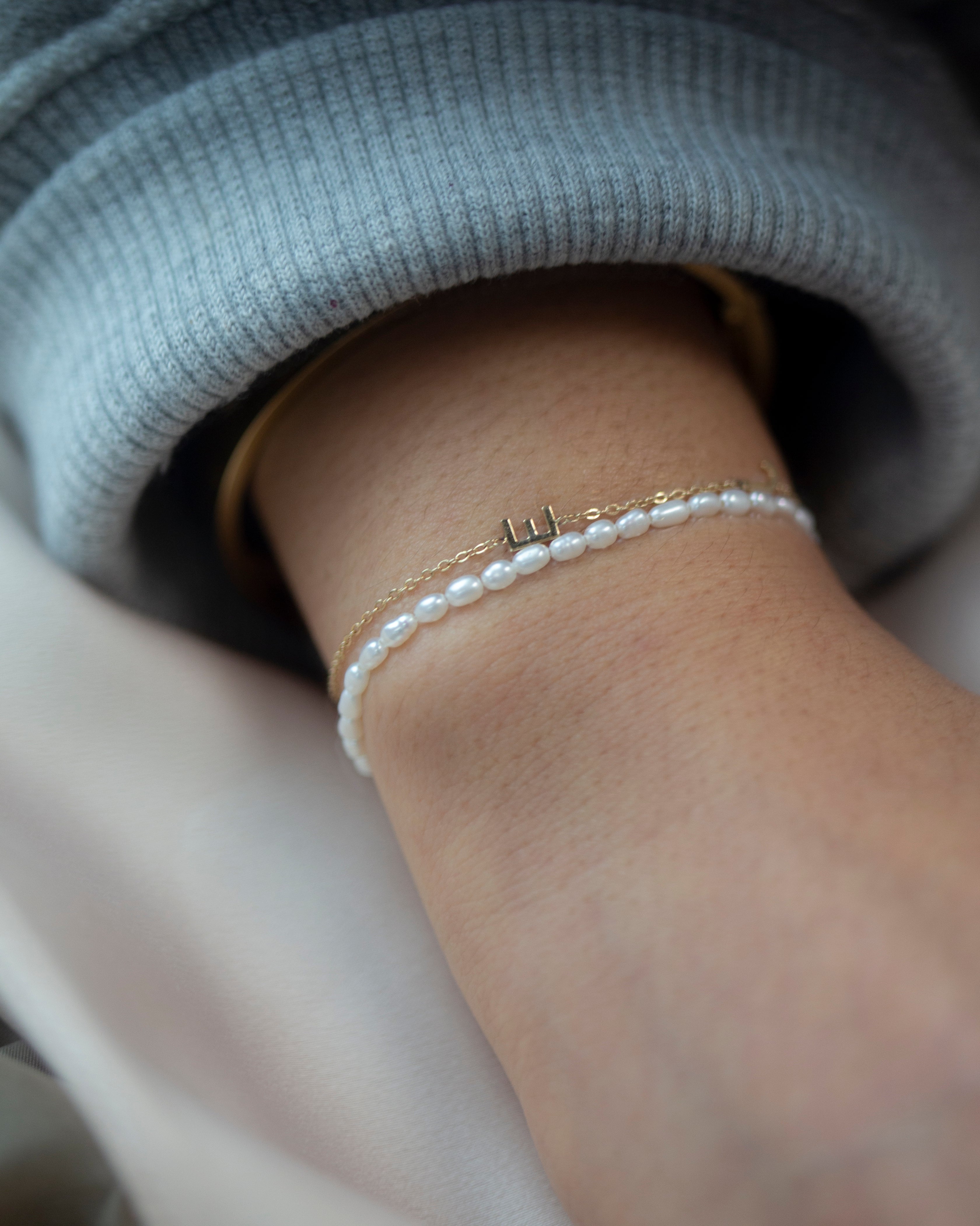 Baby Pearl Bracelet


Made with mini rice shape fresh water pearls and gold filled bead on comfy stretchy elastic band. Baby pearl bracelet will be the perfect addition to your arm stack!