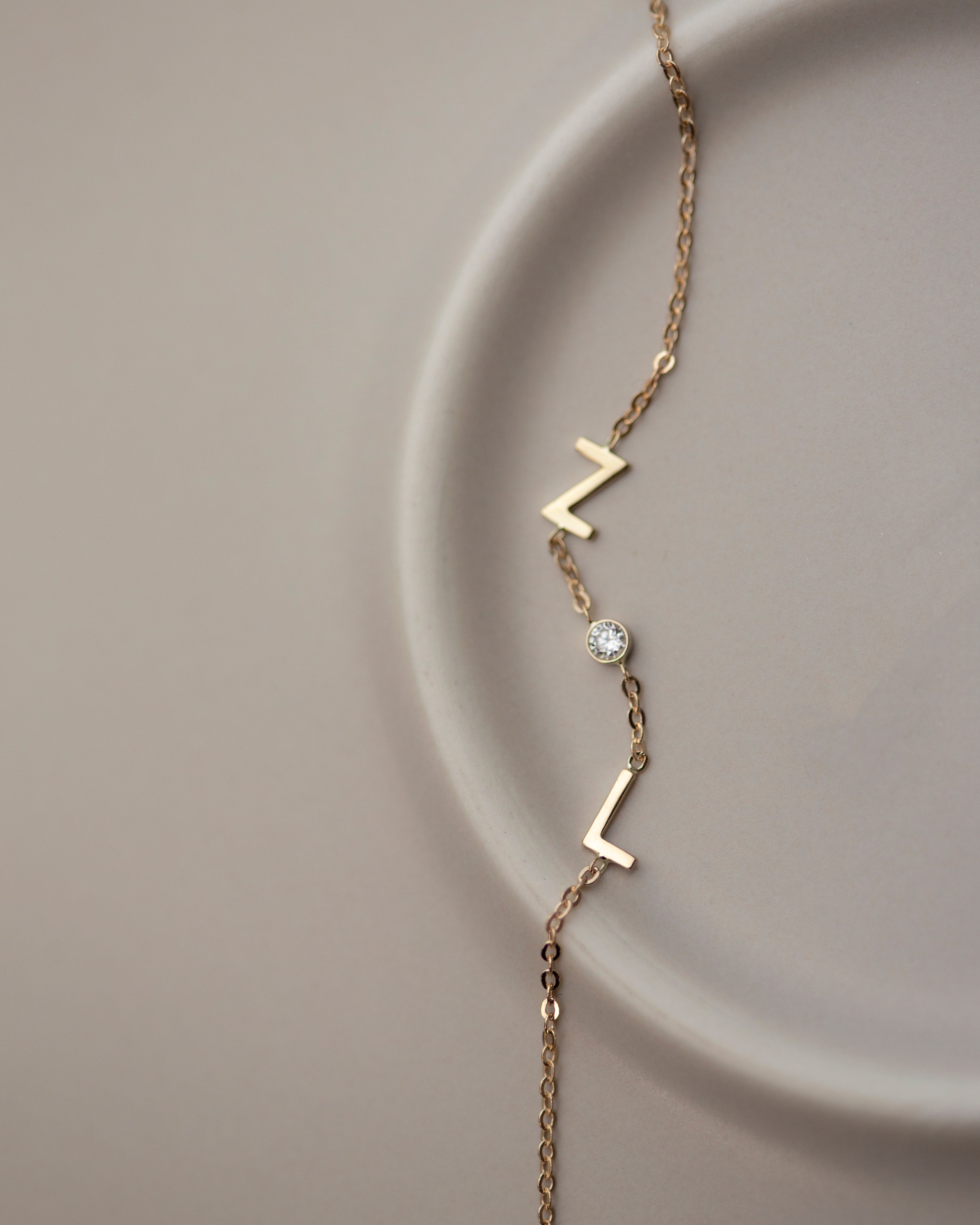 Personalized 14k solid gold initials bracelet with genuine diamond.