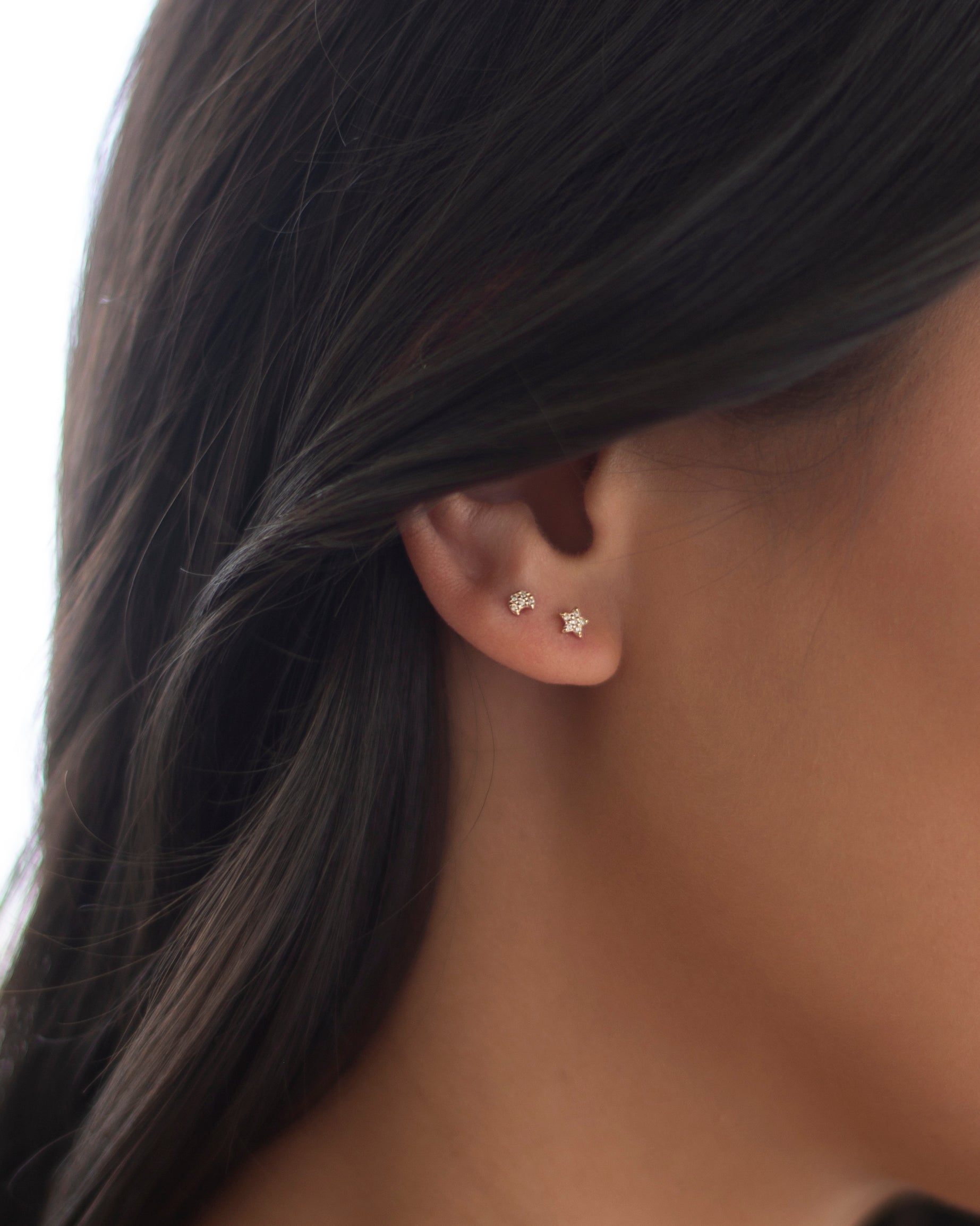 14K Yellow Gold crescent moon stud earring
Can be worn as stud for Cartilage.

Minimalist, high quality, and timeless.
Very secure and comfortable to wear.