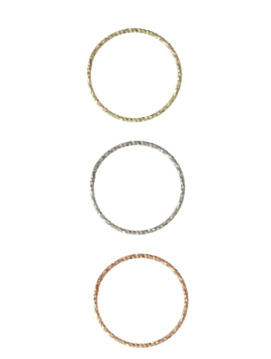 Crafted from 14k gold and featuring a diamond-cut design, these stacking rings offer a dainty and simplistic look that is perfect for everyday wear.