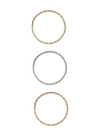 Crafted from 14k gold and featuring a diamond-cut design, these stacking rings offer a dainty and simplistic look that is perfect for everyday wear.